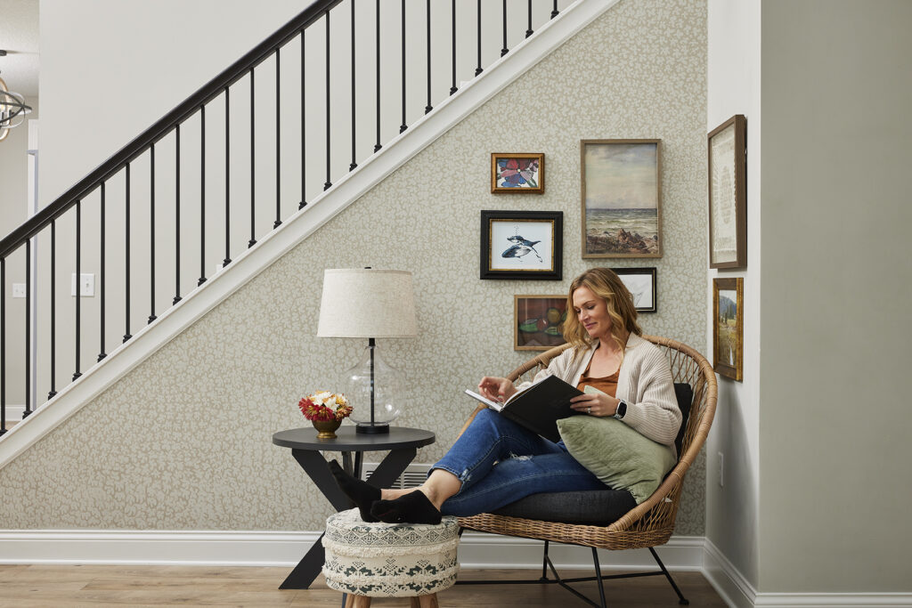 Cozy reading area with gallery wall